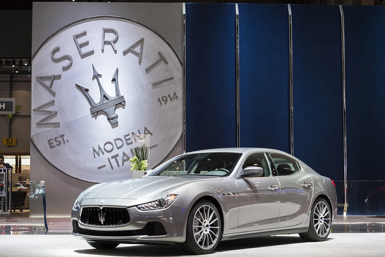 Geneva / The vehicle is framed within a complete Maserati brand environment.