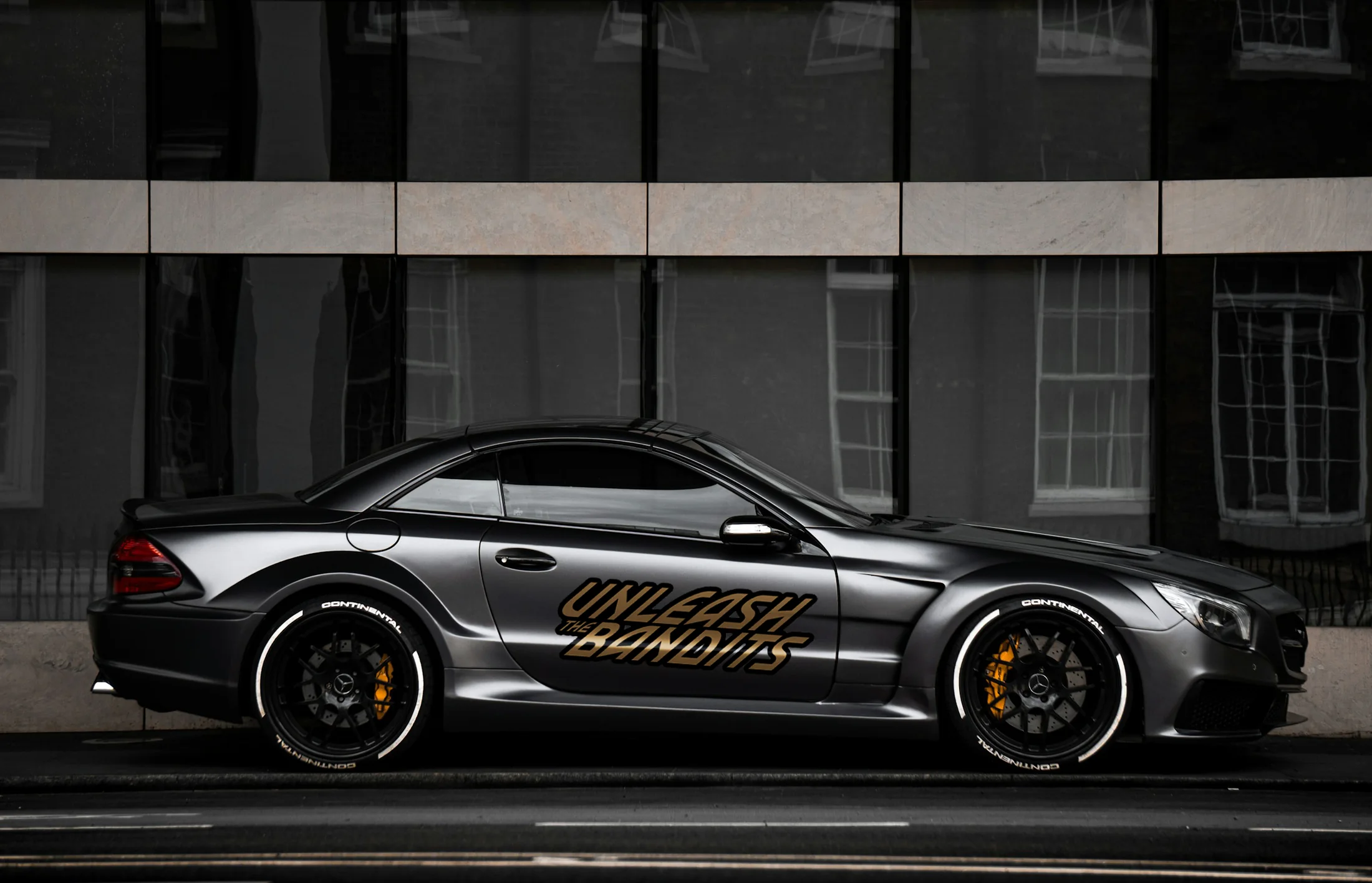 Vehicle graphics make the rally recognizable on the street.