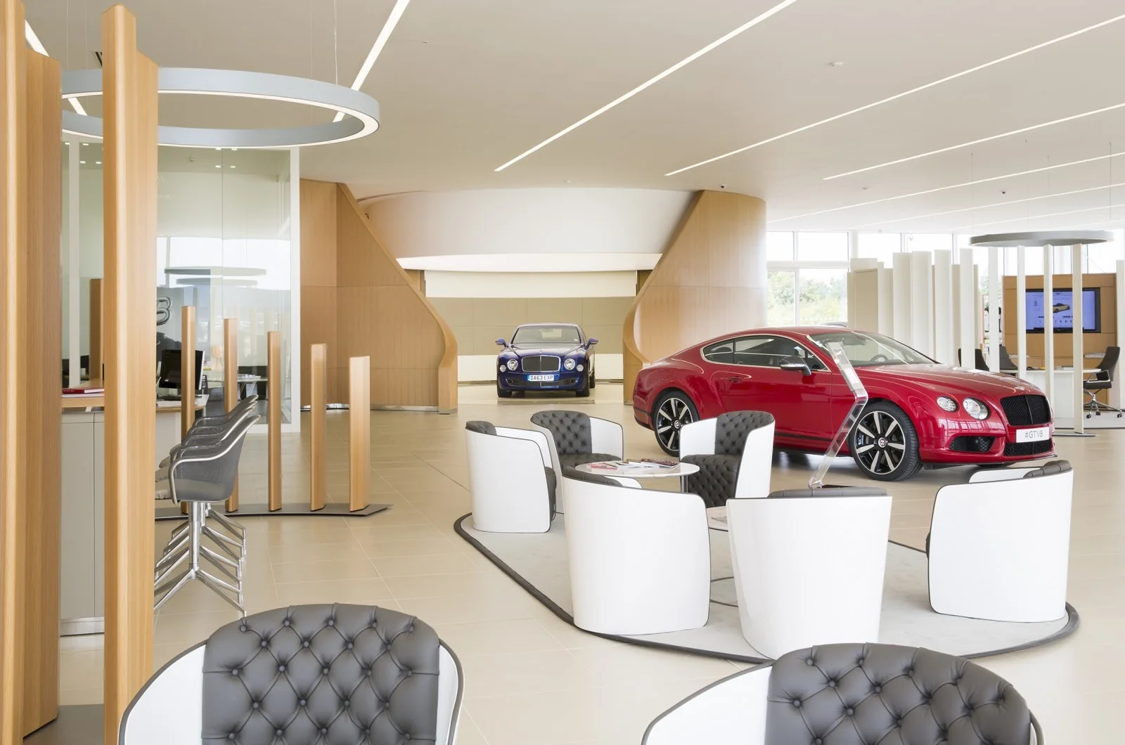 CW1 House / Interior circulation connects the vehicle with the surrounding retail settings.