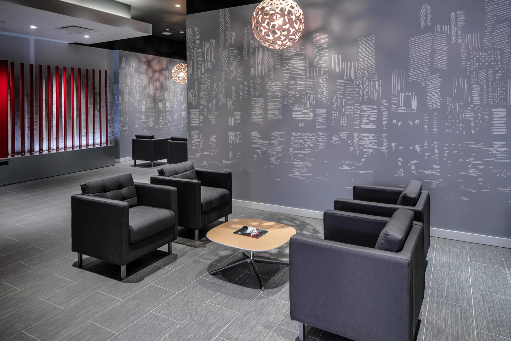 A lounge makes room to pause within the performance-inspired setting.