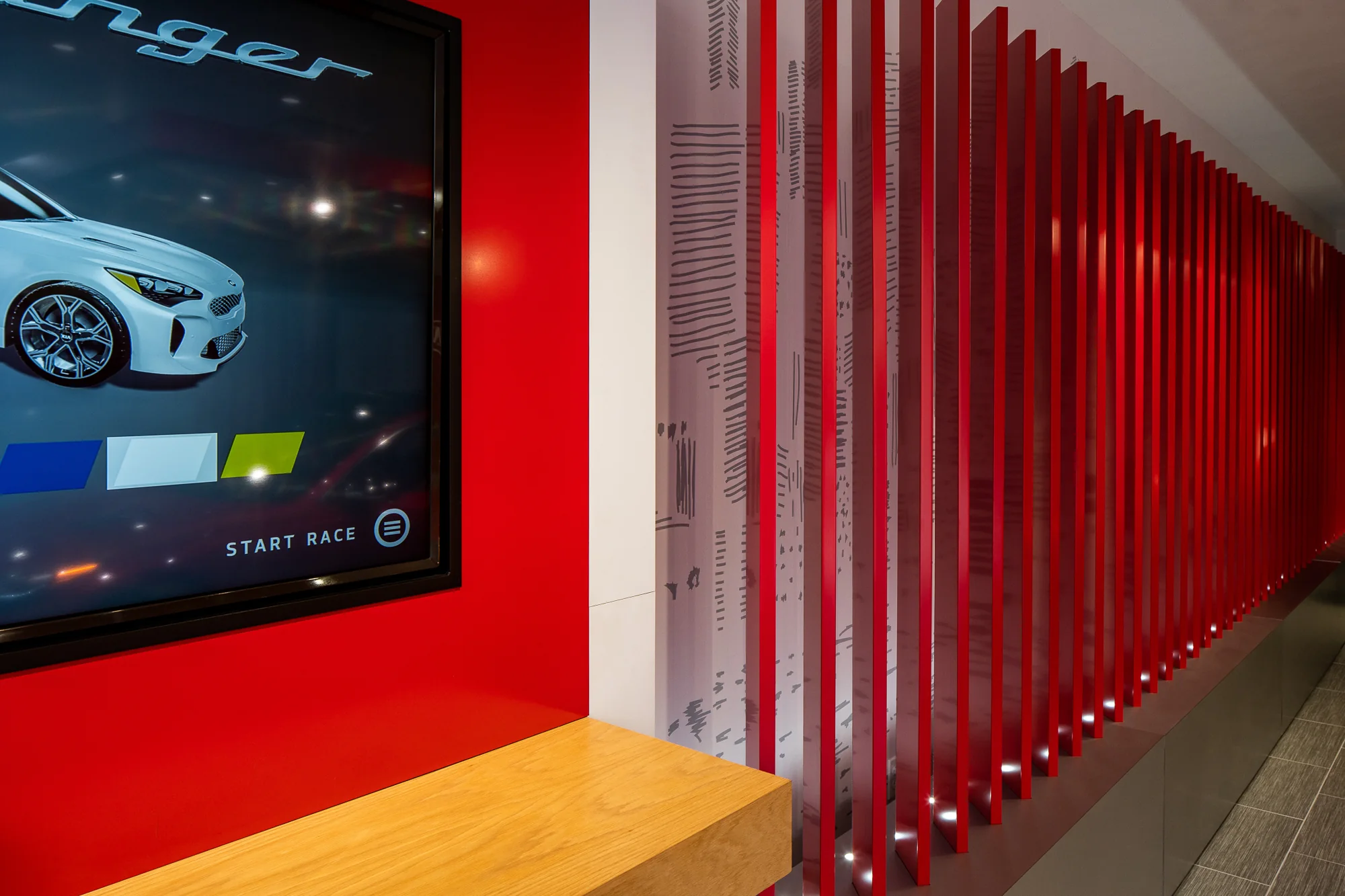 Digital content is integrated into the same red architectural system.