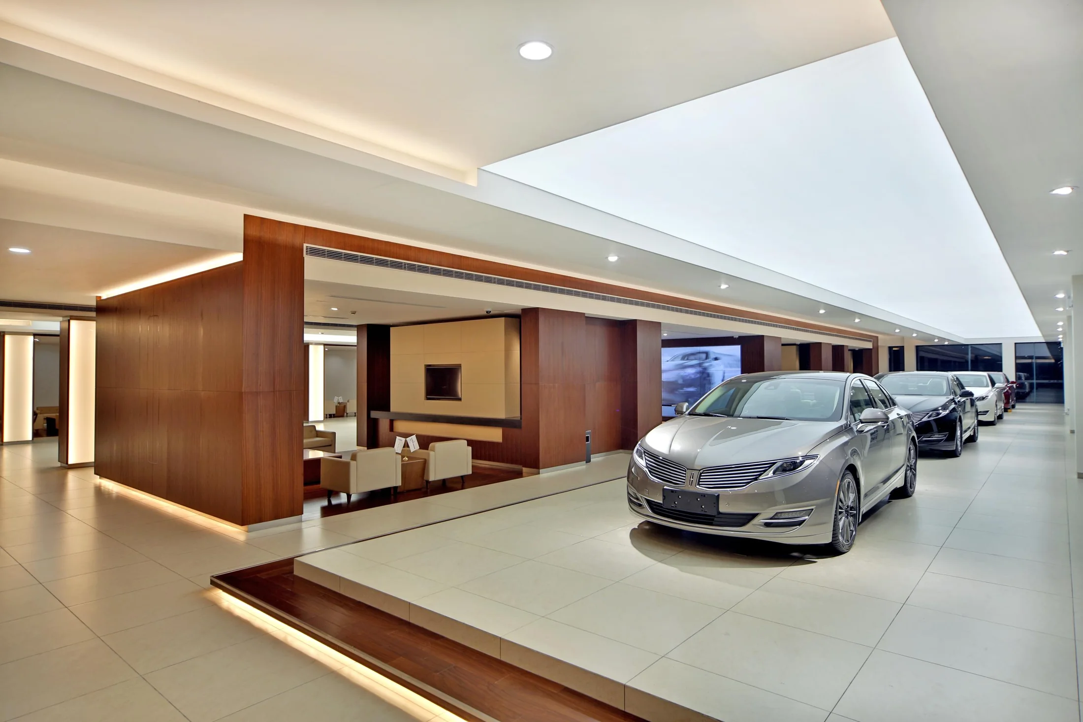 Vehicle display and customer circulation are considered as one continuous interior.