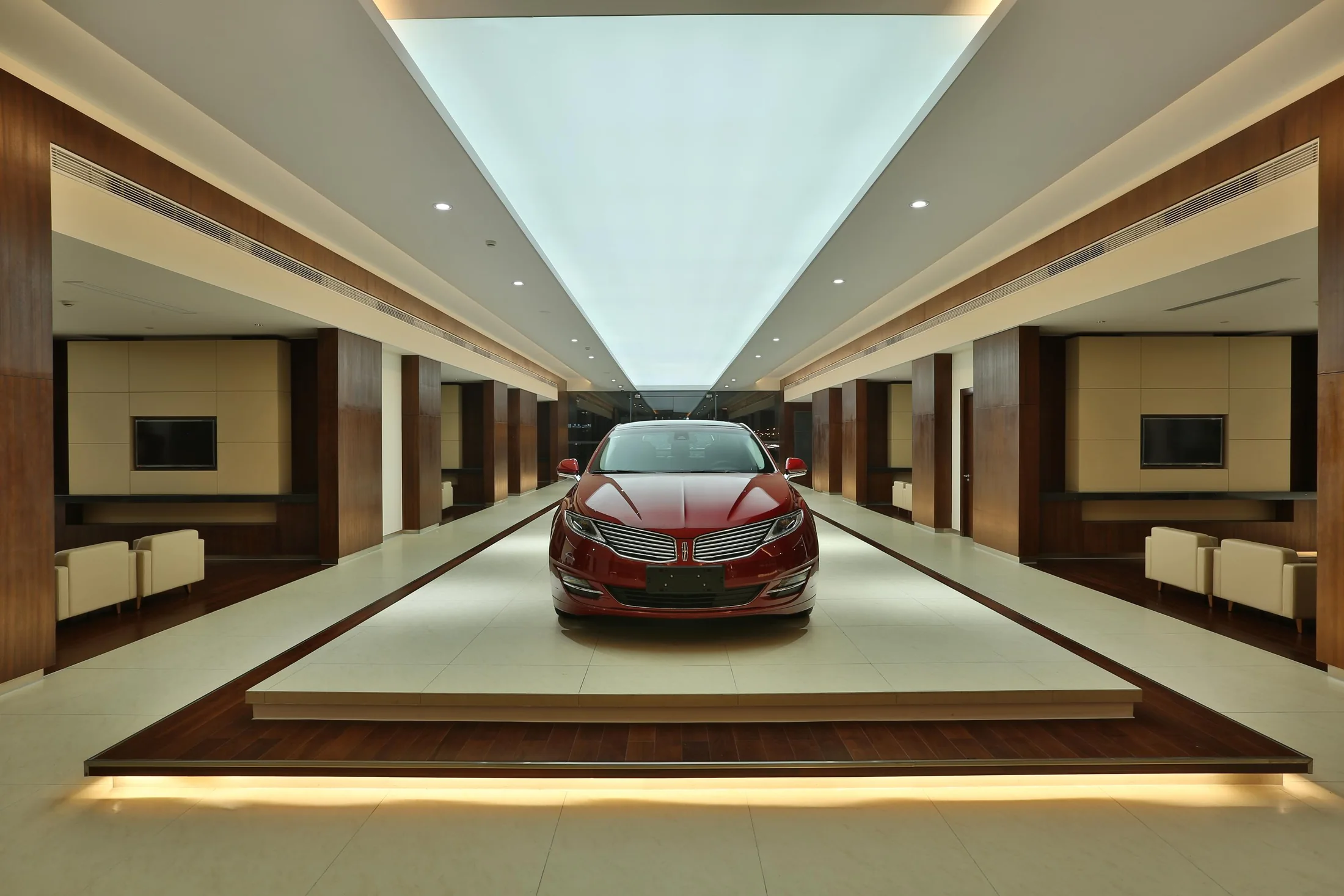 The vehicle is framed as the focal point of the customer visit.