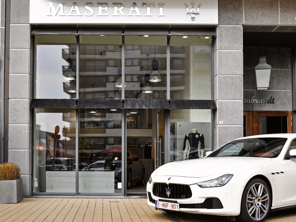 Knokke / A compact Maserati destination opens directly onto the street.