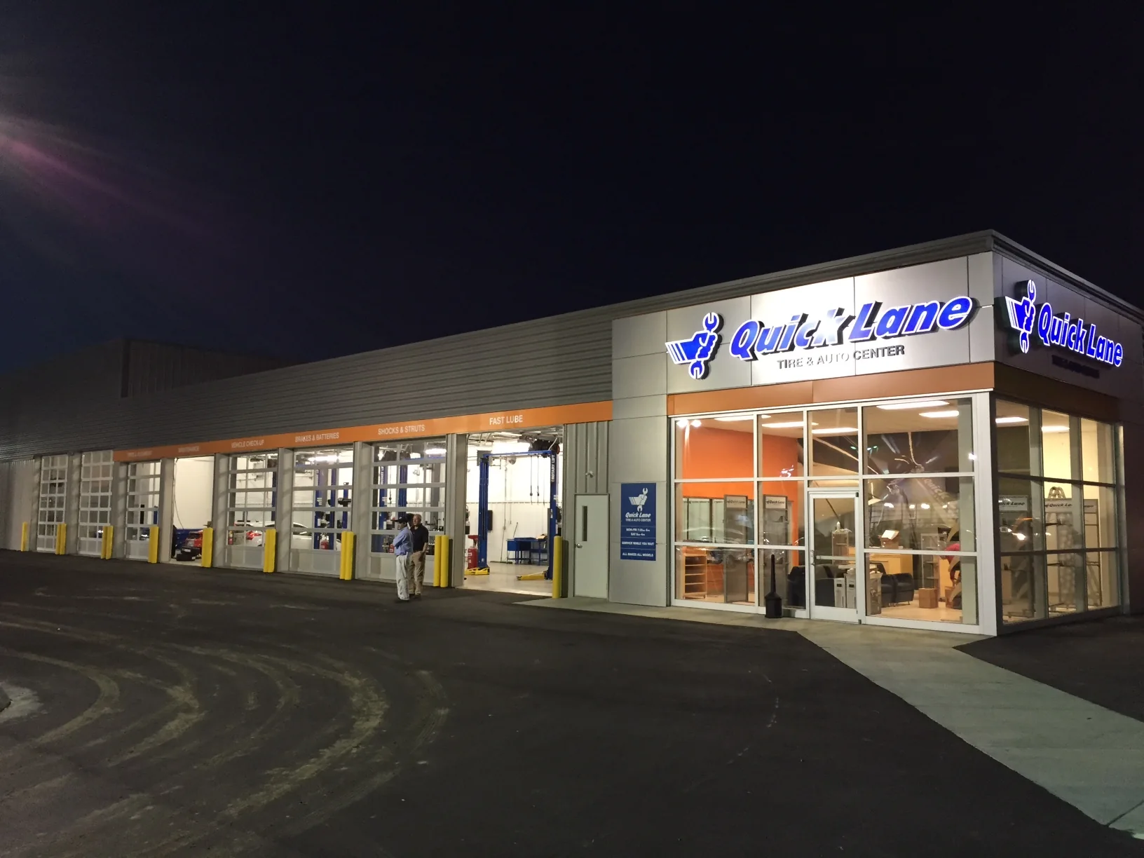 Lumberton / The Quick Lane identity introduces the service environment at night.