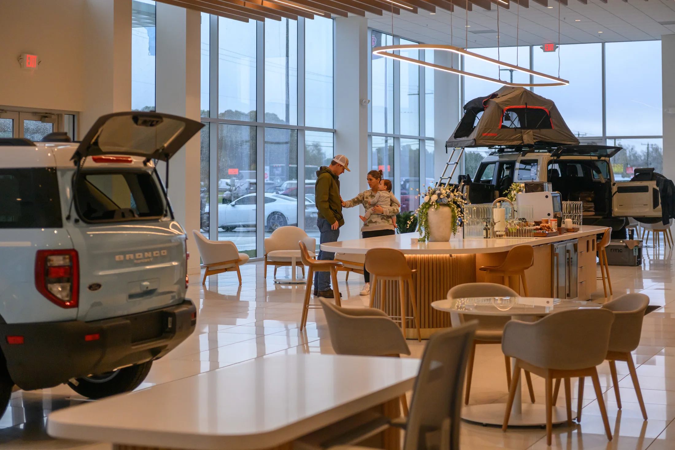 Vehicles, people and the Hub share the same showroom.