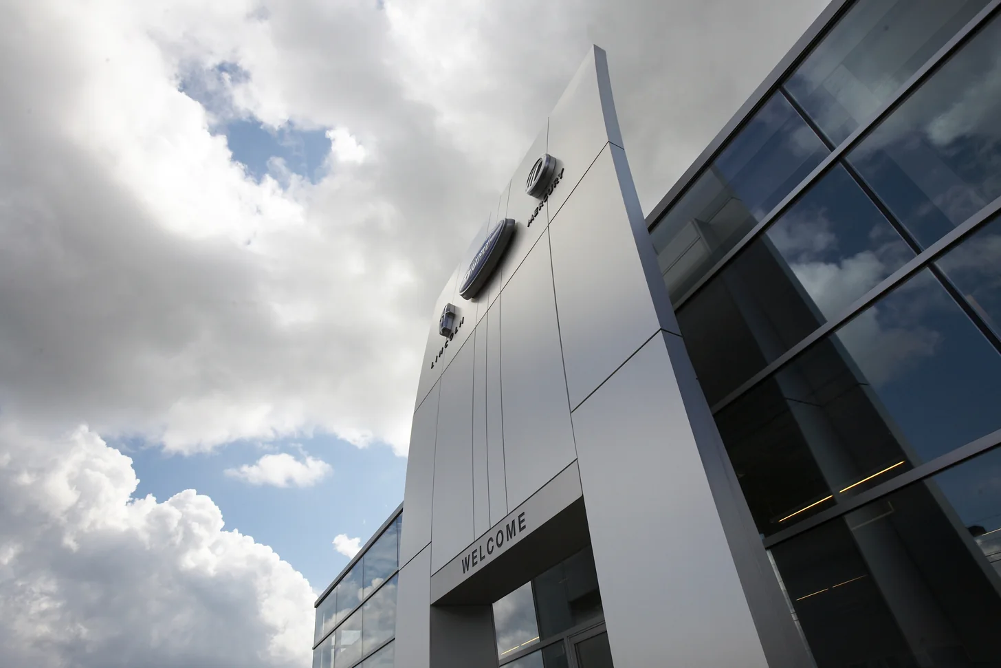 Glazing, cladding and the exterior frame carry the brand standard into the building.