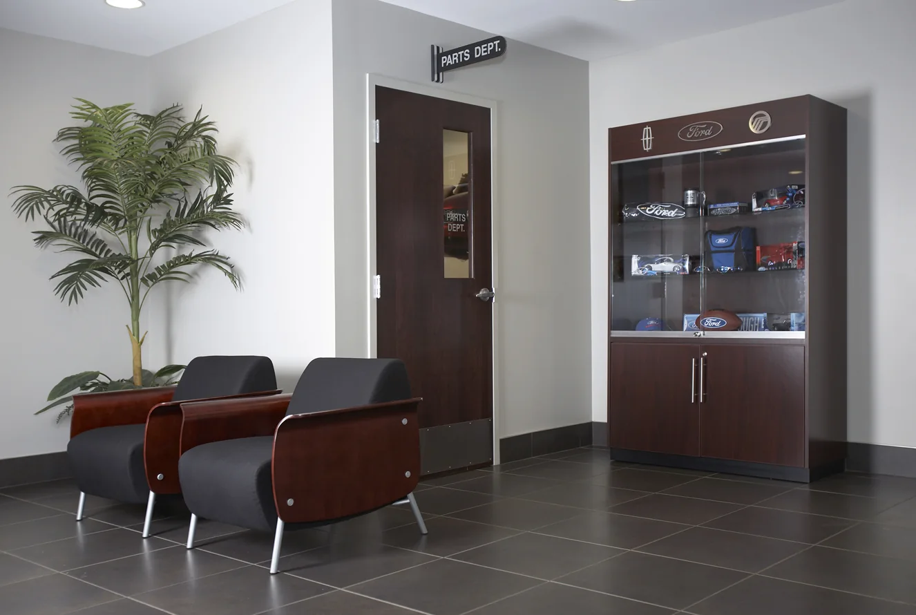 A quieter customer seating area sits within the same material framework.