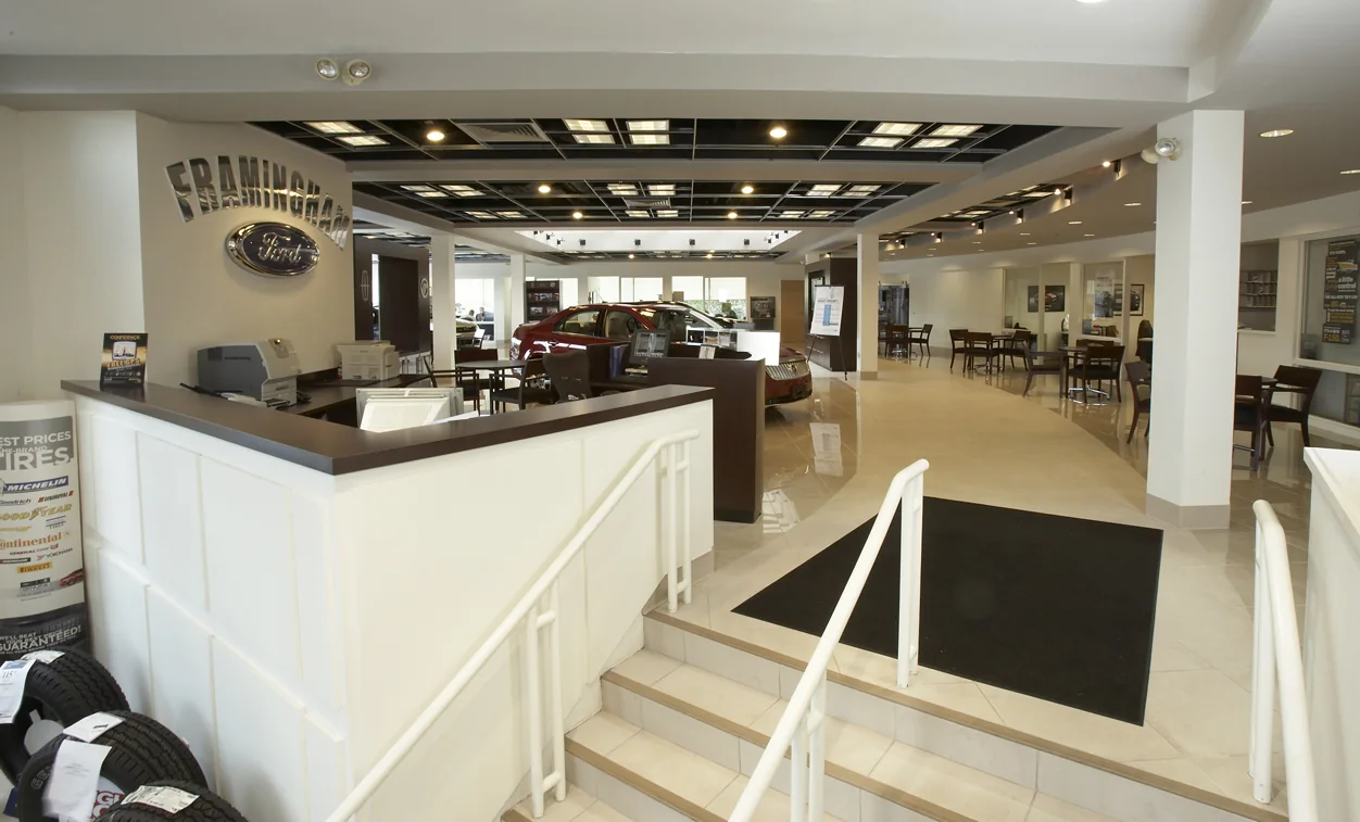 Framingham / Brand presence, information and the customer welcome share one setting.