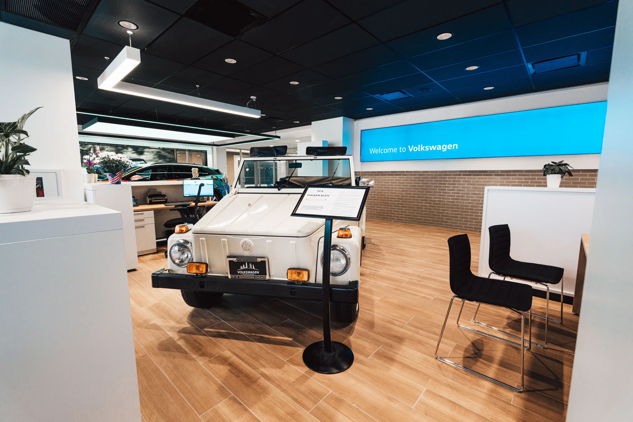 A familiar Volkswagen icon sits within the contemporary display environment.