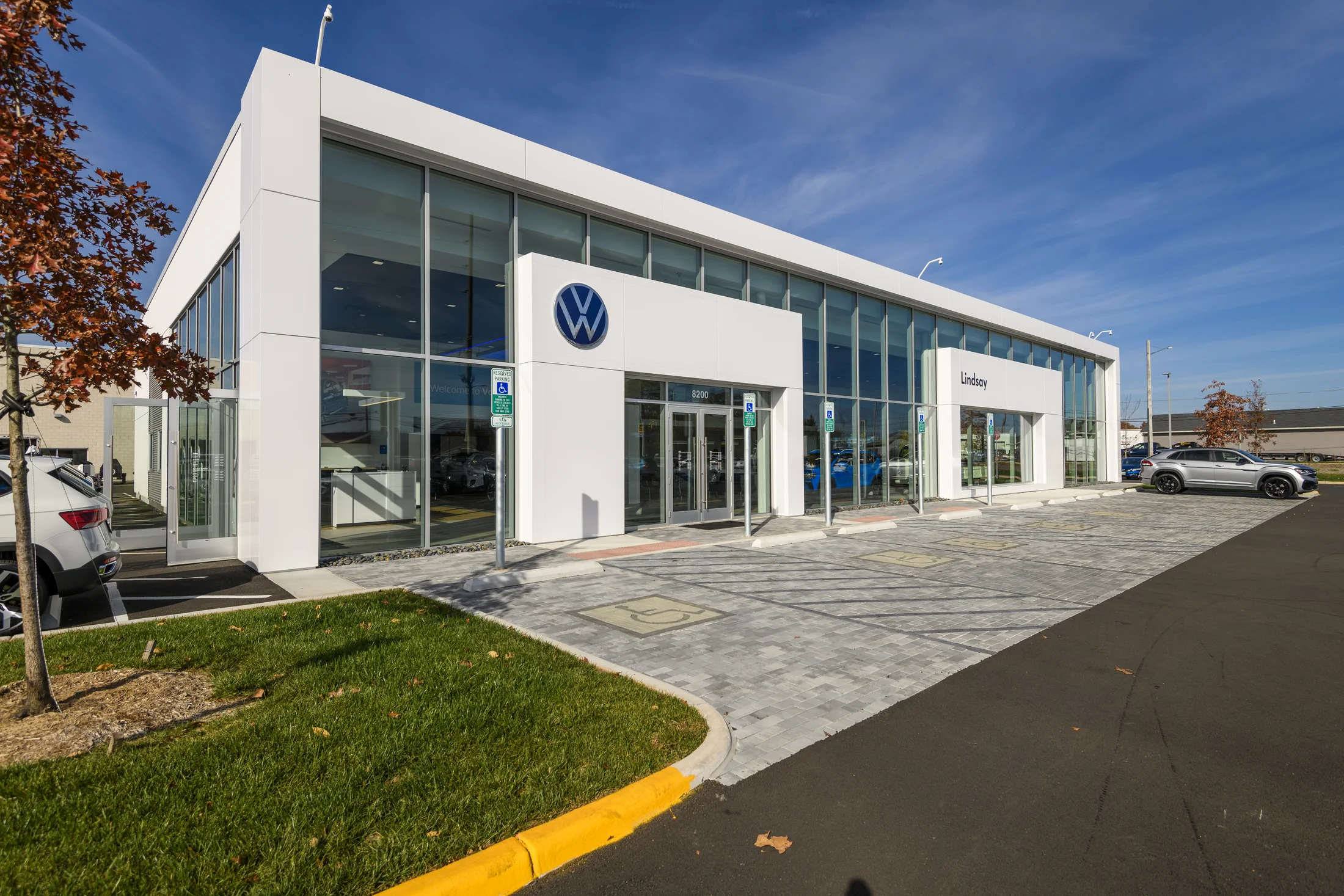 The street-facing frame gives the dealership a clear point of arrival.