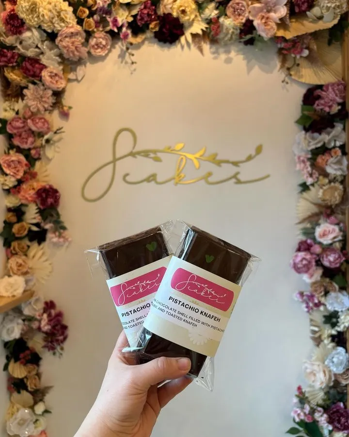 Material choices bring the patisserie’s identity into tangible form.