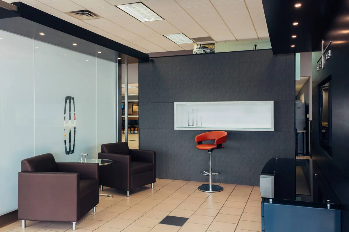 The studio fits into the dealership without losing its own identity.